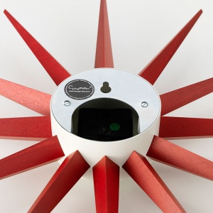 VITRA nástěnné hodiny Sunburst Clock červená